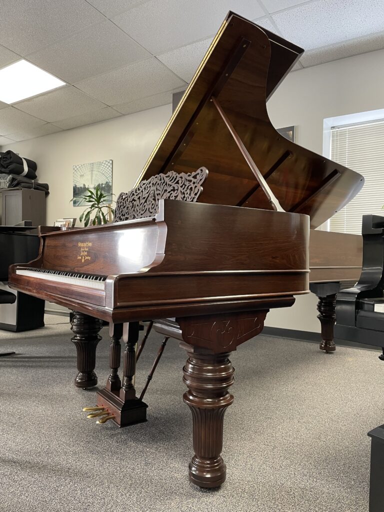 Luxury restored grand piano ready for a designer interior
