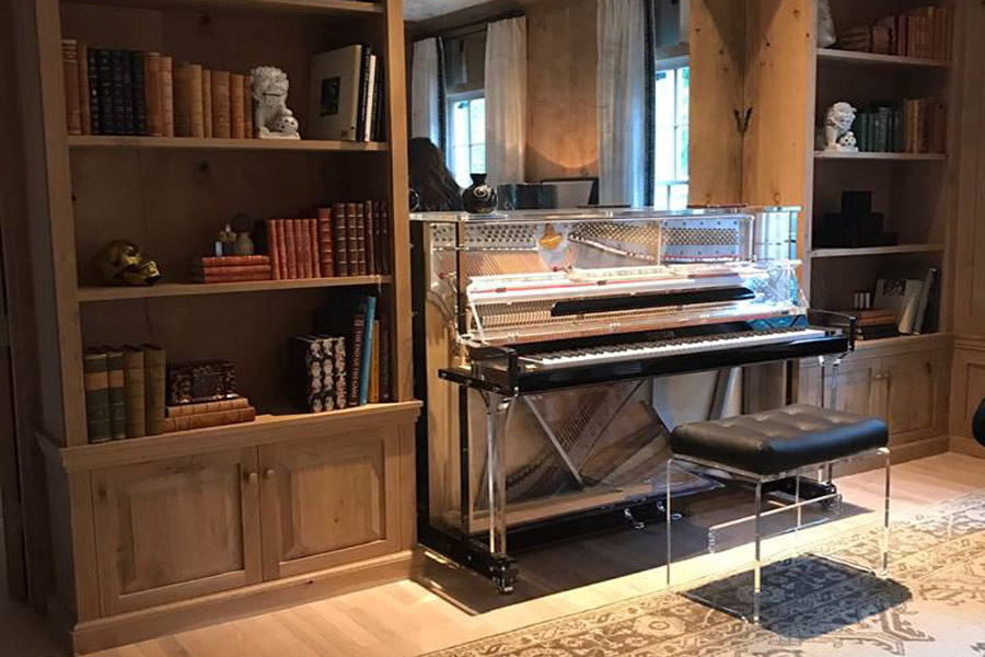 Suggested Image Alt Text:
Crystal acrylic grand piano in a refined contemporary living space